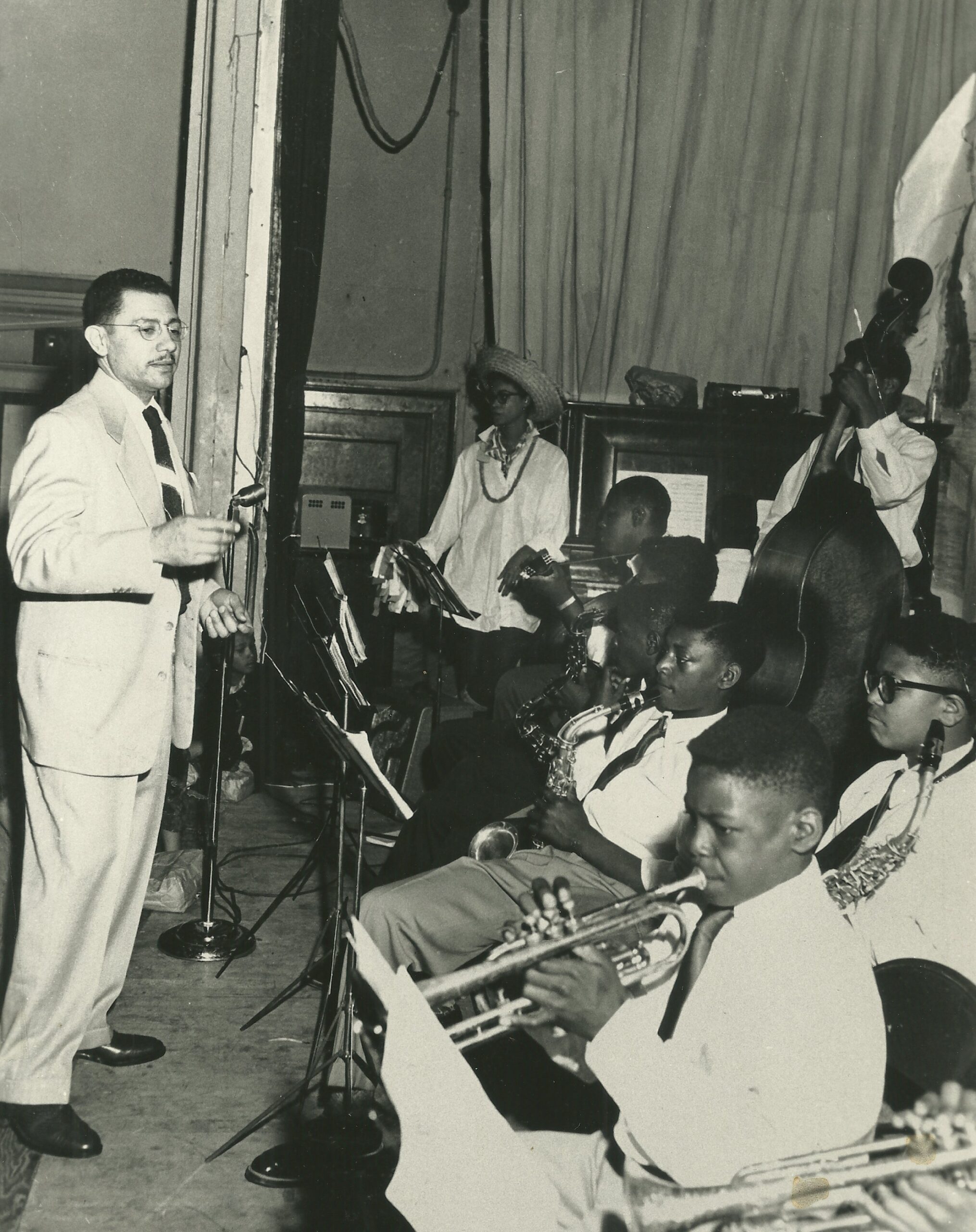 Louis L. Wilcox teaching Neighborhood House band