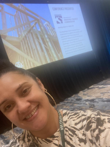 Rose Makasini in front of a presentation